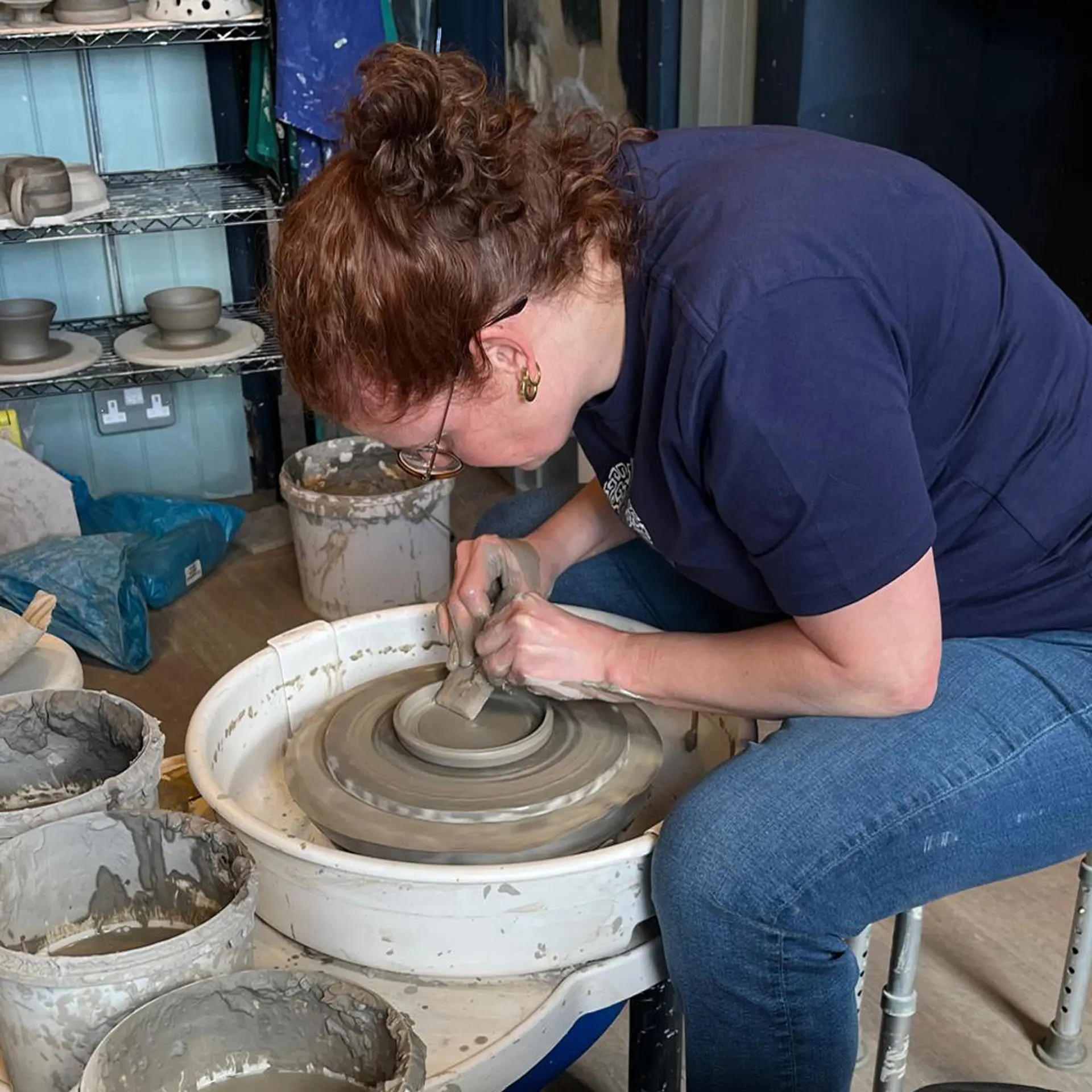 membership-potter-making-bowl